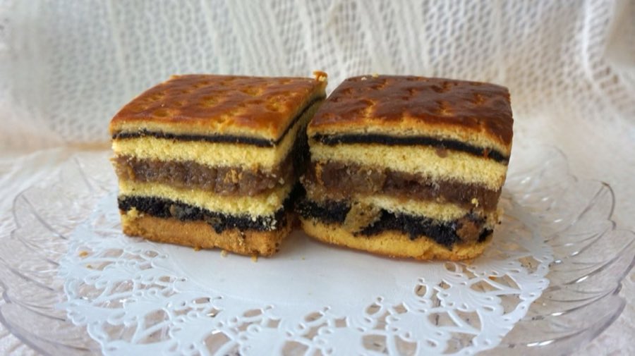 Two halves of sliced babka showing the spiral pattern