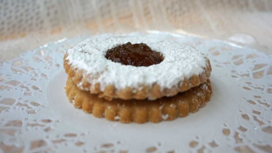 Slice of fruit strudel on a paper doily