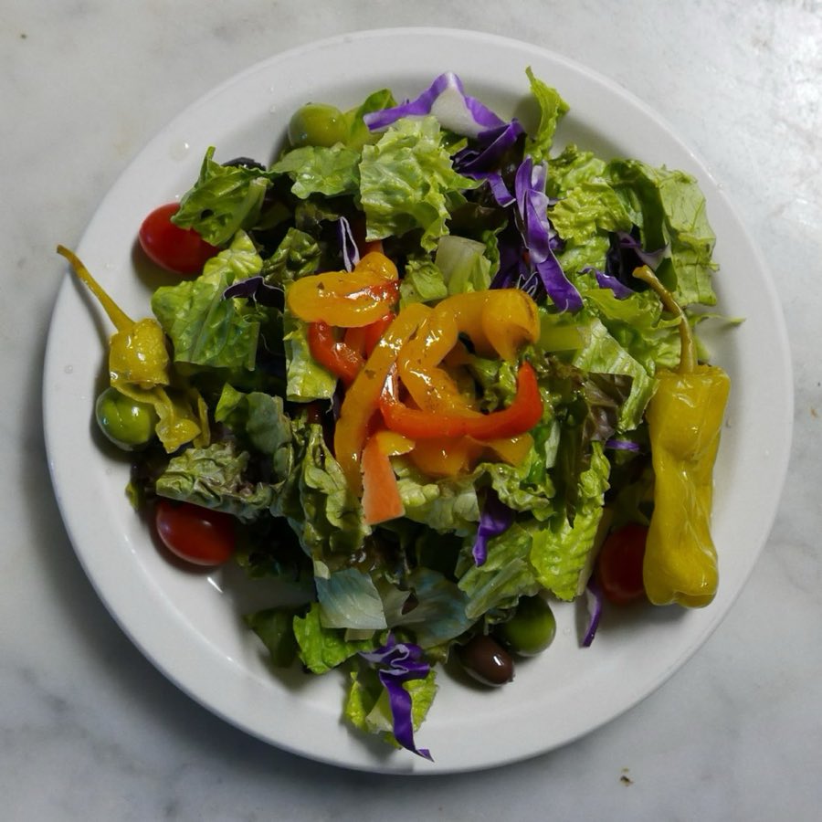 A fresh green house salad with peppers