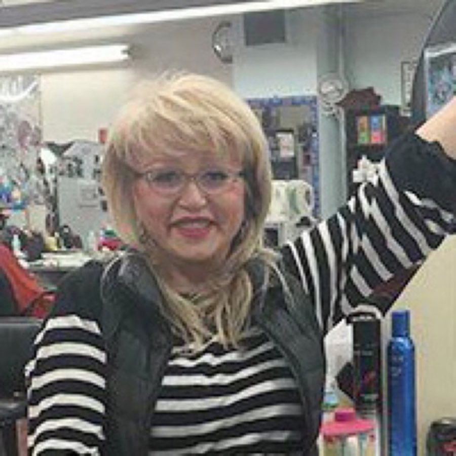 Portrait of stylist Bella in the shop