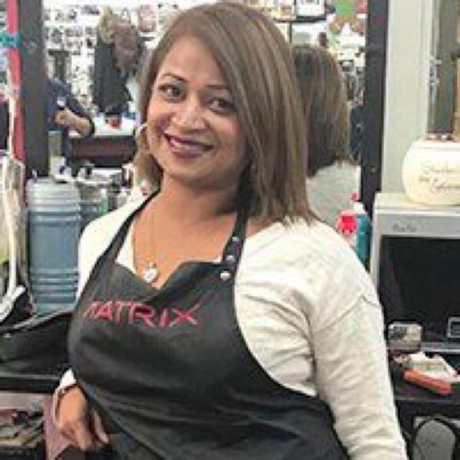 Portrait of stylist Dee in the shop