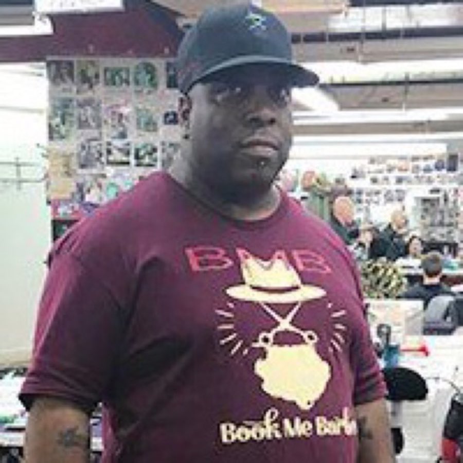 Portrait of barber Deon in the shop