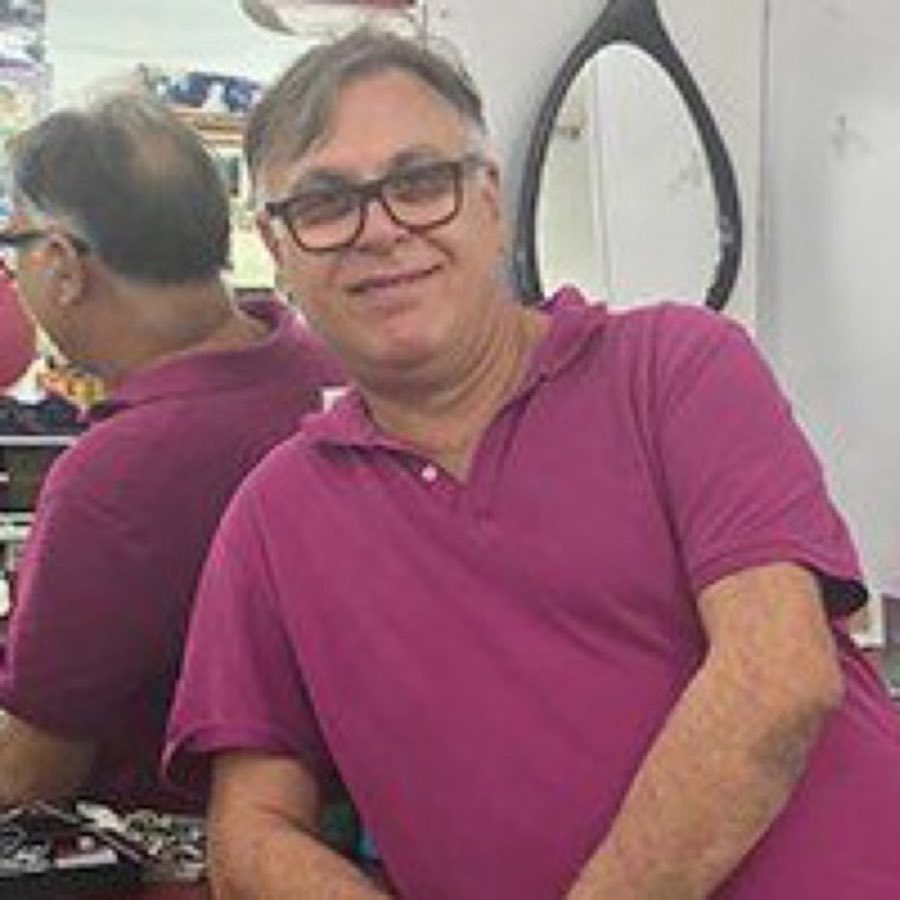 Portrait of barber Dominick in the shop