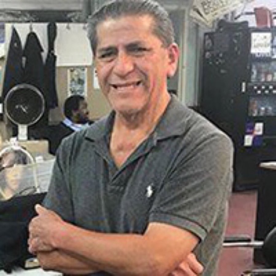 Portrait of barber Jose in the shop