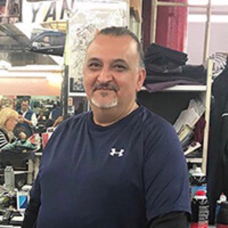 Portrait of barber Yan in the shop
