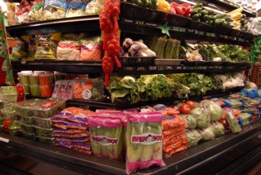 Produce aisle with fresh vegetables on display