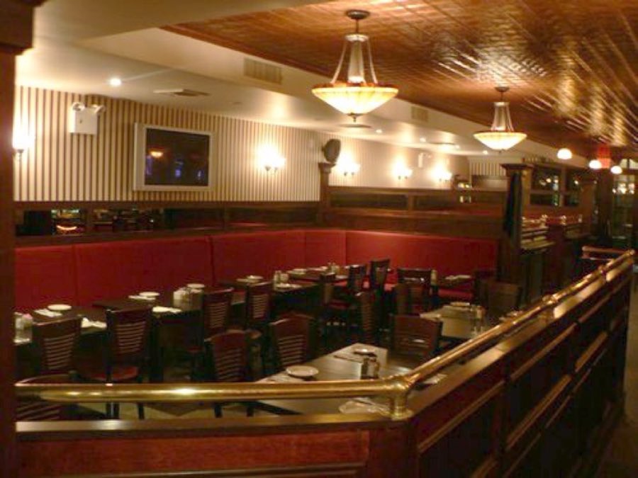 Jake's Saloon dining room with red banquettes