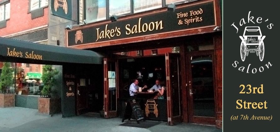 Jake's Saloon storefront on West 23rd Street with a black awning