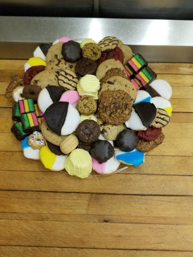A platter of assorted rugelach, black-and-white cookies, and rainbow cookies