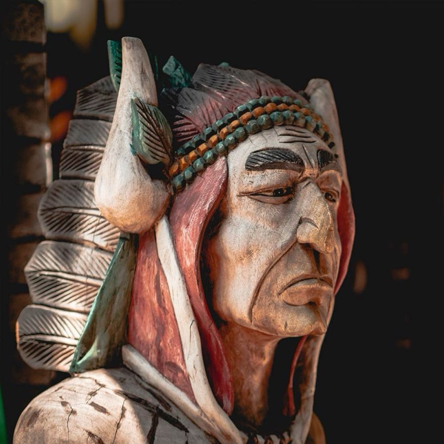 Close-up of the carved wooden trade figure that has stood outside the barbershop for generations