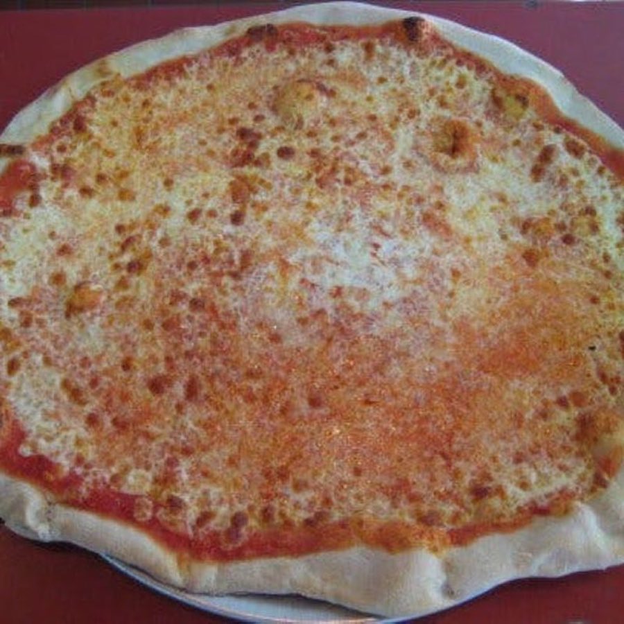 A whole cheese pizza with browned mozzarella on a metal tray