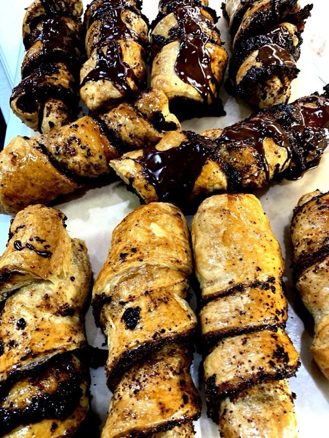 Chocolate-drizzled homemade pastries, baked on premises