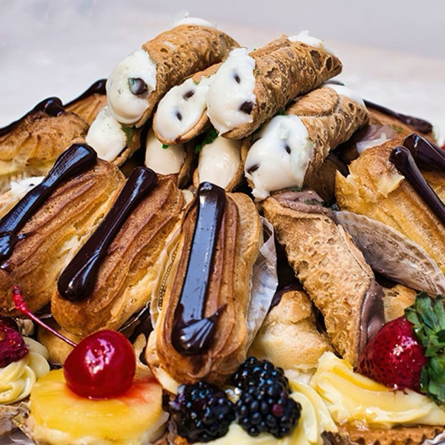 An assortment of miniature Italian pastries arranged on a serving tray